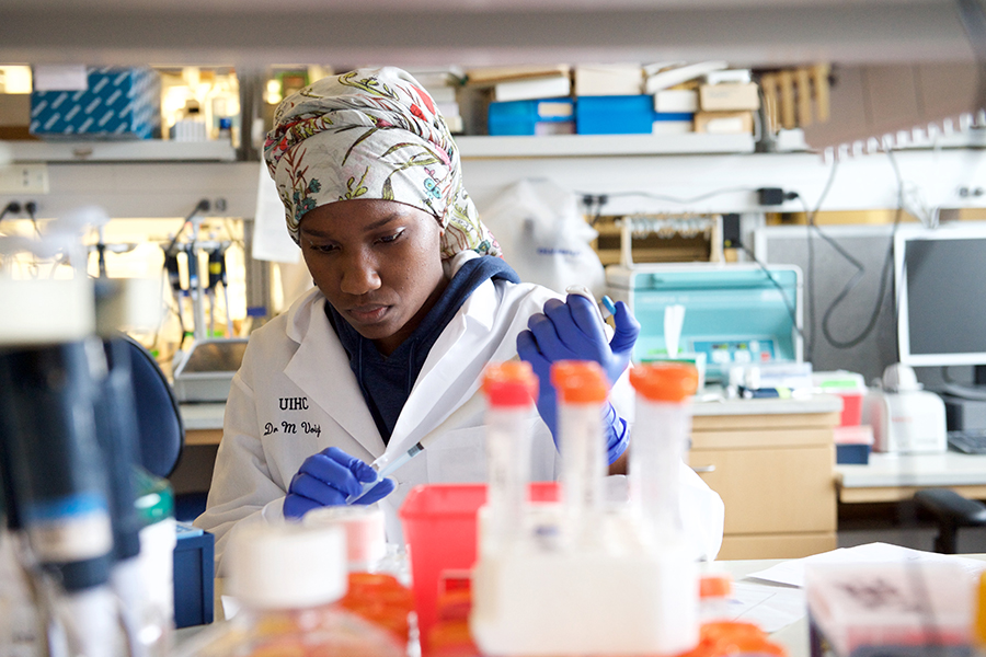 Researcher pipetting