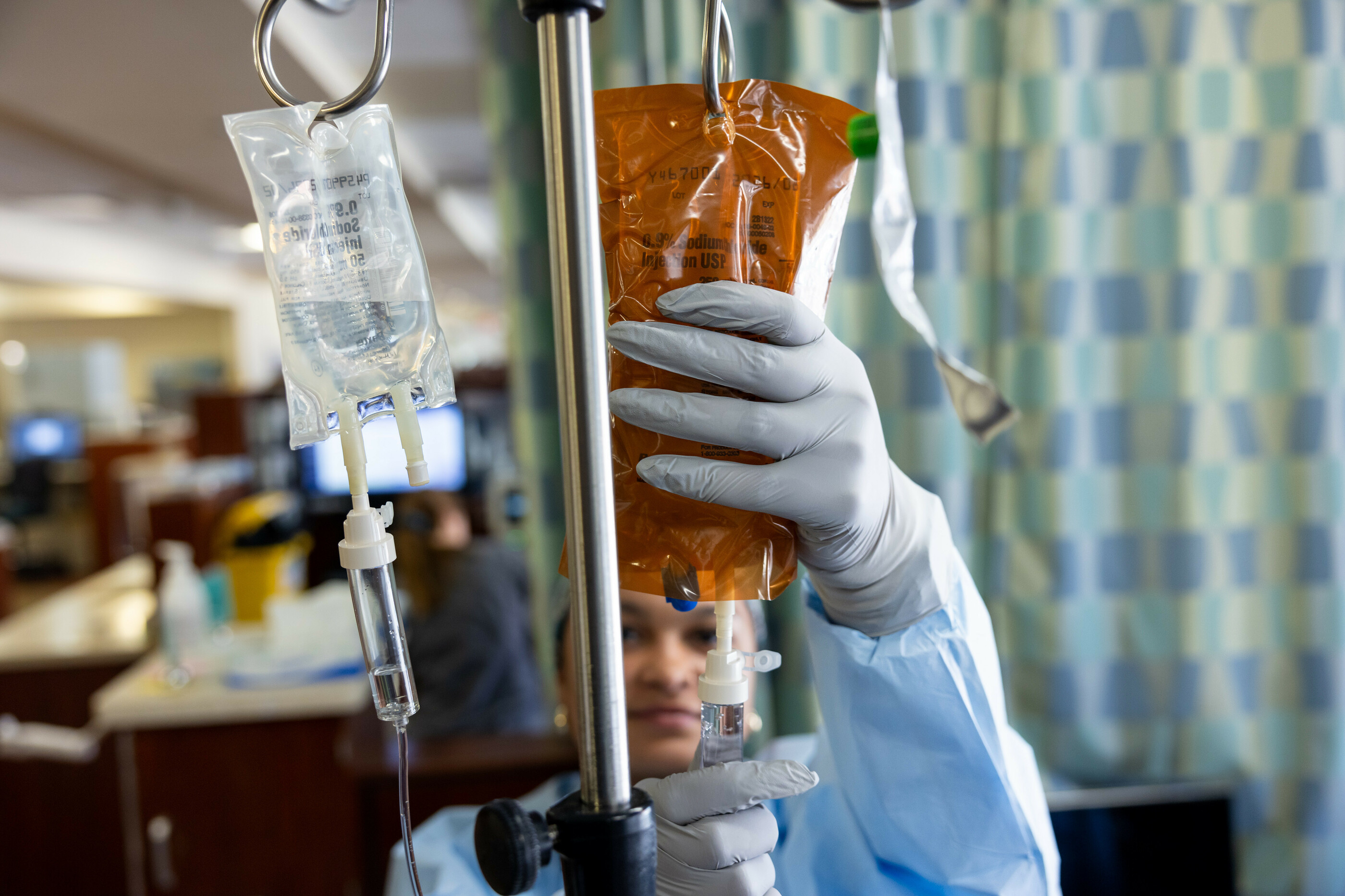 Staff nurse Sydnee Turner RN BSN in the infusion center at Holden Comprehensive Cancer Center on the UI Health Care university campus on Monday, May 5, 2025. Patient consent on file.